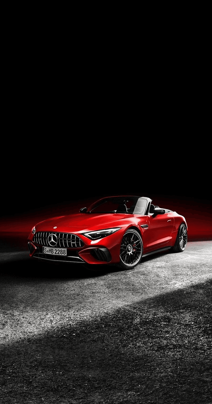 Video thumbnail showing a sleek red Mercedes convertible sports car